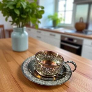 Elegant Silver Tea Cup and Saucer Set